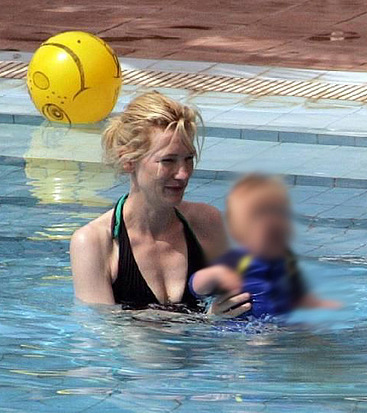 Cate Blanchett sunbathing