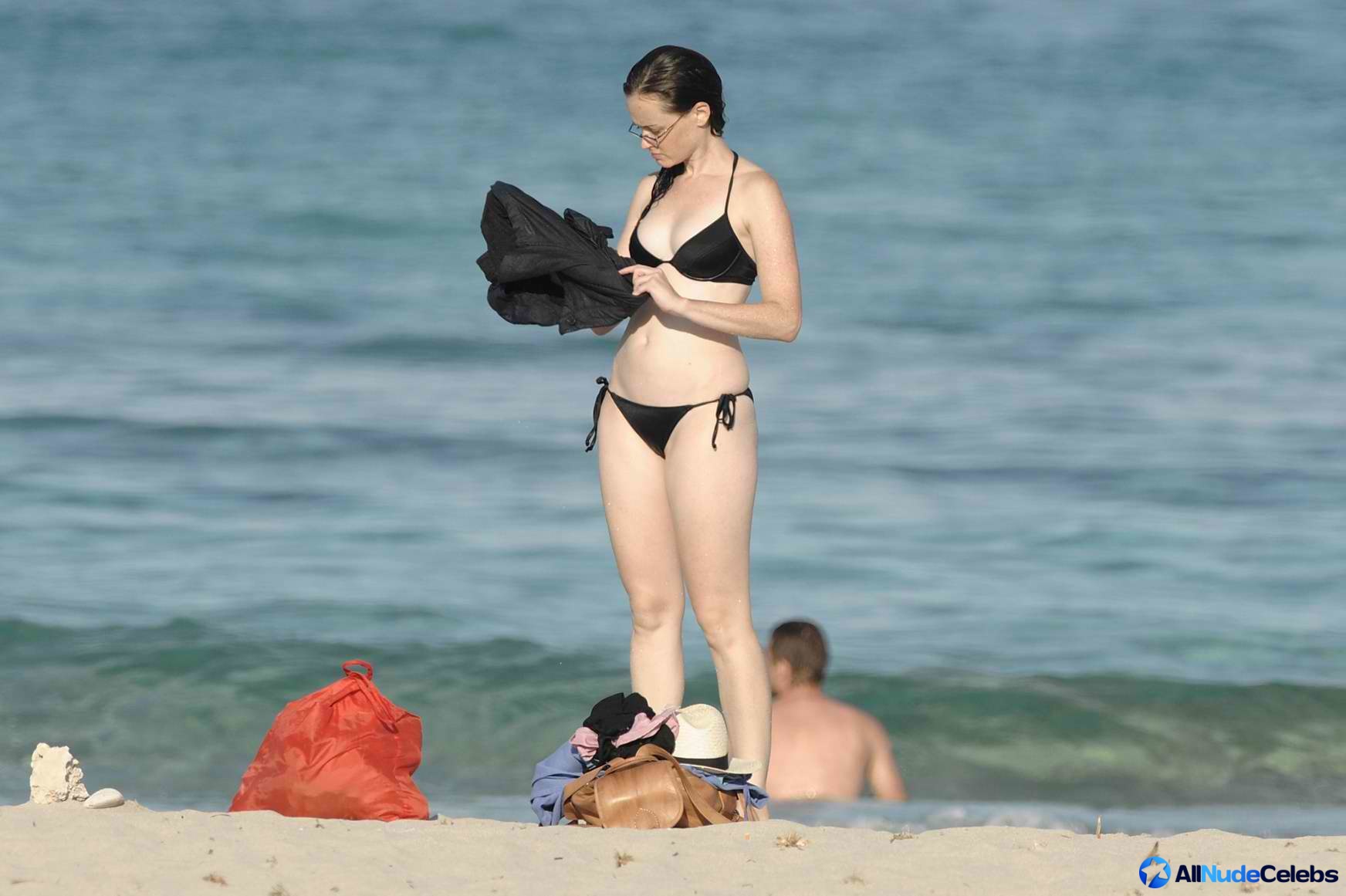 Alexis Bledel paparazzi bikini photos.
